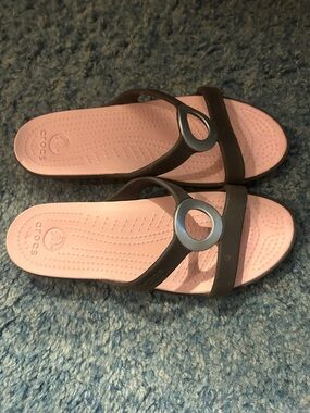 CROCS Pink Footbed with Black Strap Circular Accent Sandals